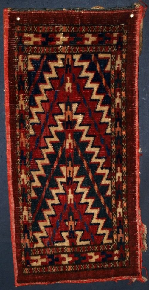 antique yomut turkmen spindle bag with plain weave back circa 1900
