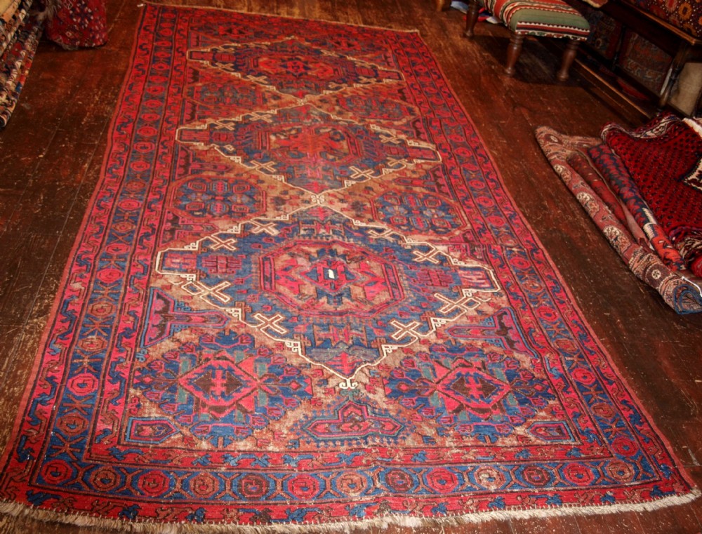 old caucasian soumak rug traditional design some heavy wear circa 1920