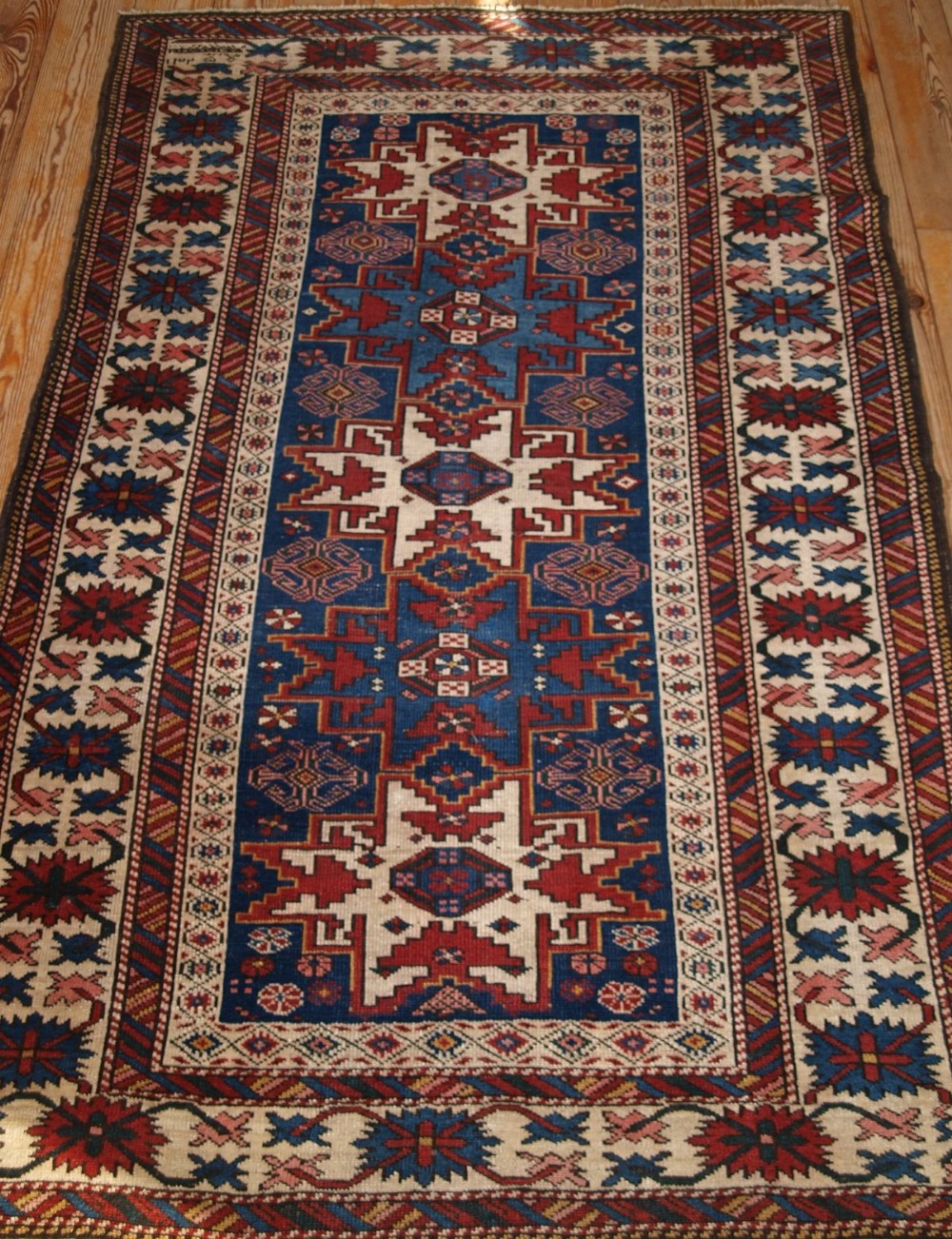 antique caucasian rug with lesghi star design dated 1325 circa 1900