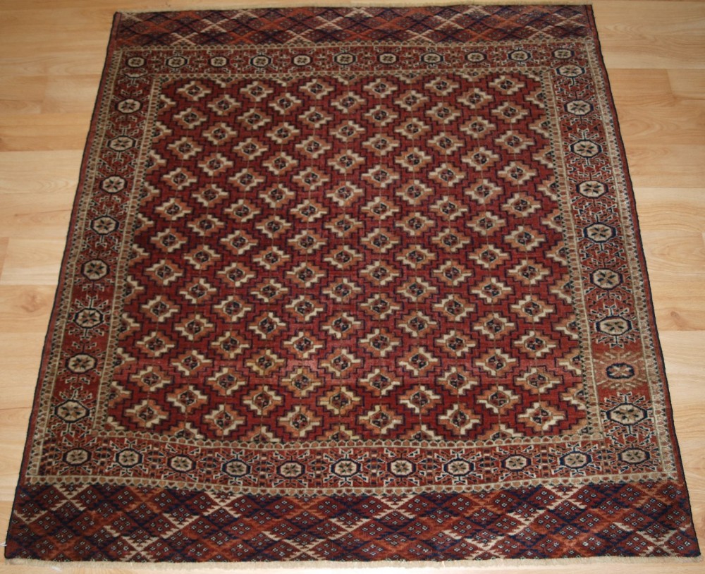 antique tekke turkmen small square dowry rug with chuval guls circa 1900