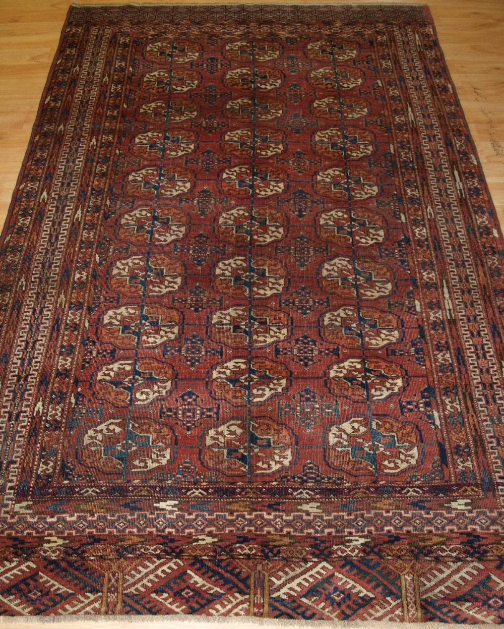antique tekke turkmen rug well drawn with large guls circa 1900