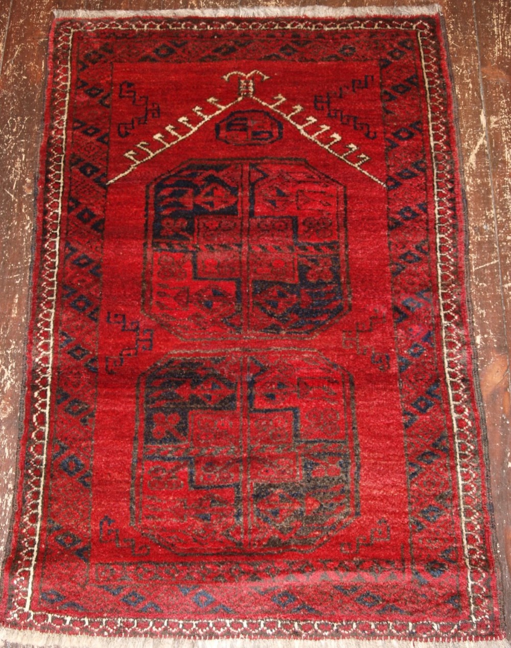old afghan prayer rug of traditional village design about 60 years old