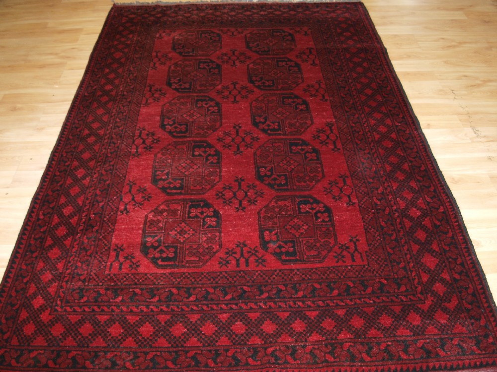 old afghan village rug of traditional design about 60 years old
