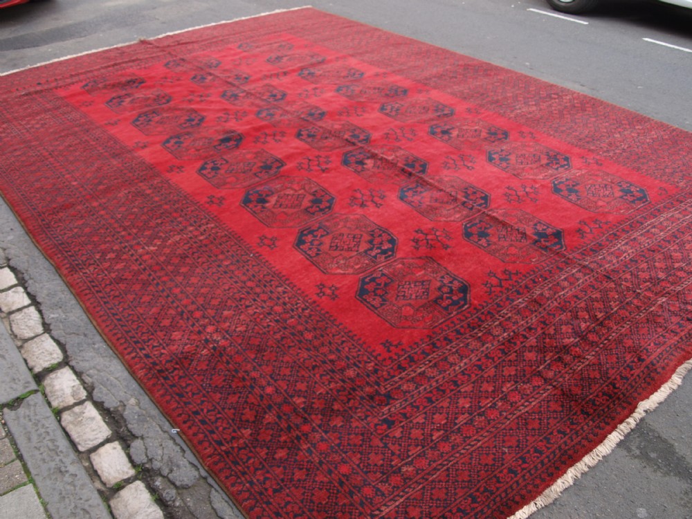 old afghan village carpet of exceptional large size great colour and condition circa 1920