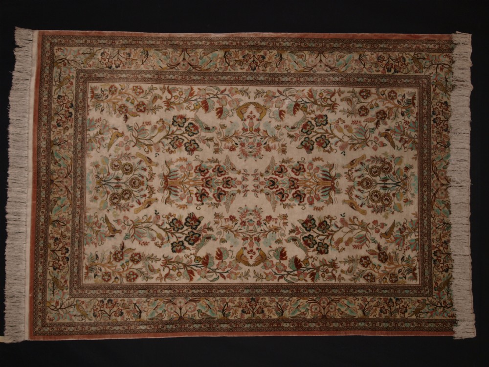 outstanding persian qum silk rug with garden design one of a pair about 50 years old