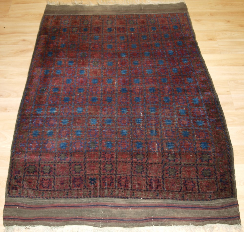 antique afghan timuri baluch rug of very unusual star design circa 1880