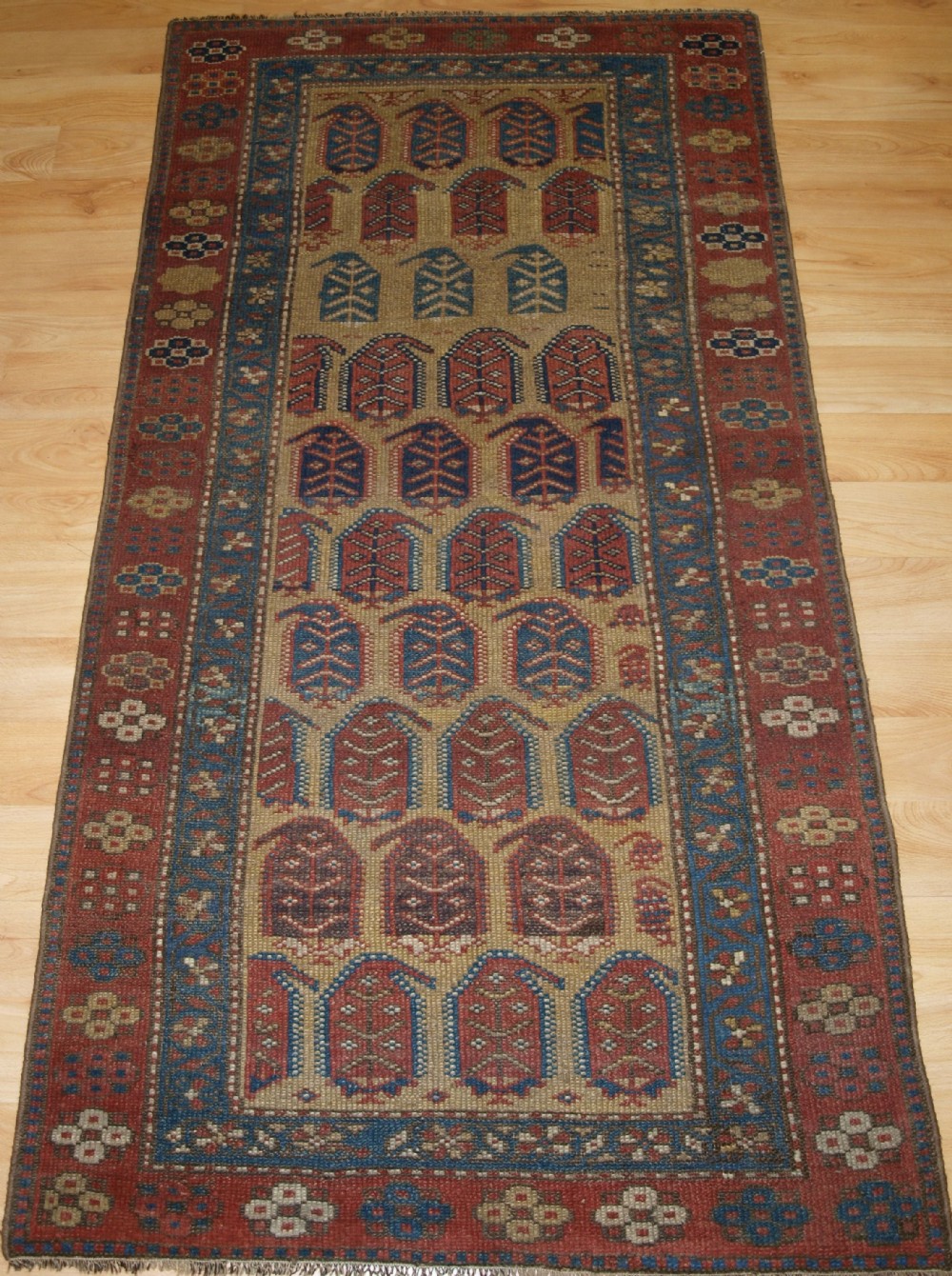 antique kurdish rug with large boteh design soft colours circa 1900