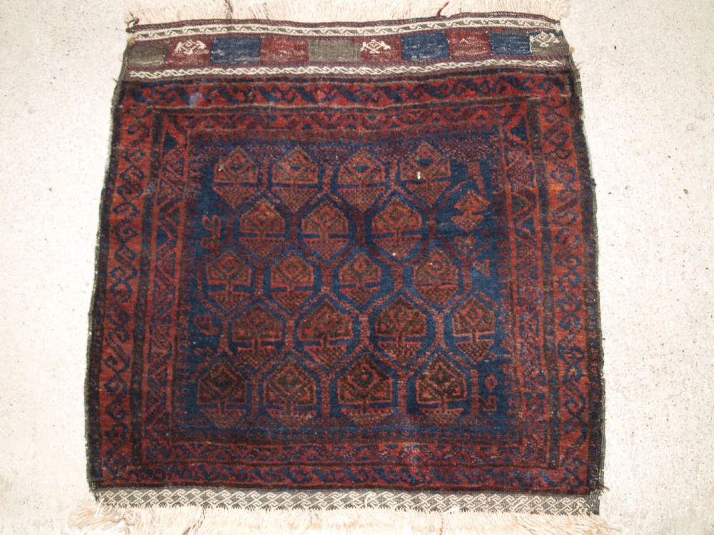 antique timuri baluch bag face with traditional design closing panel at top circa 1920