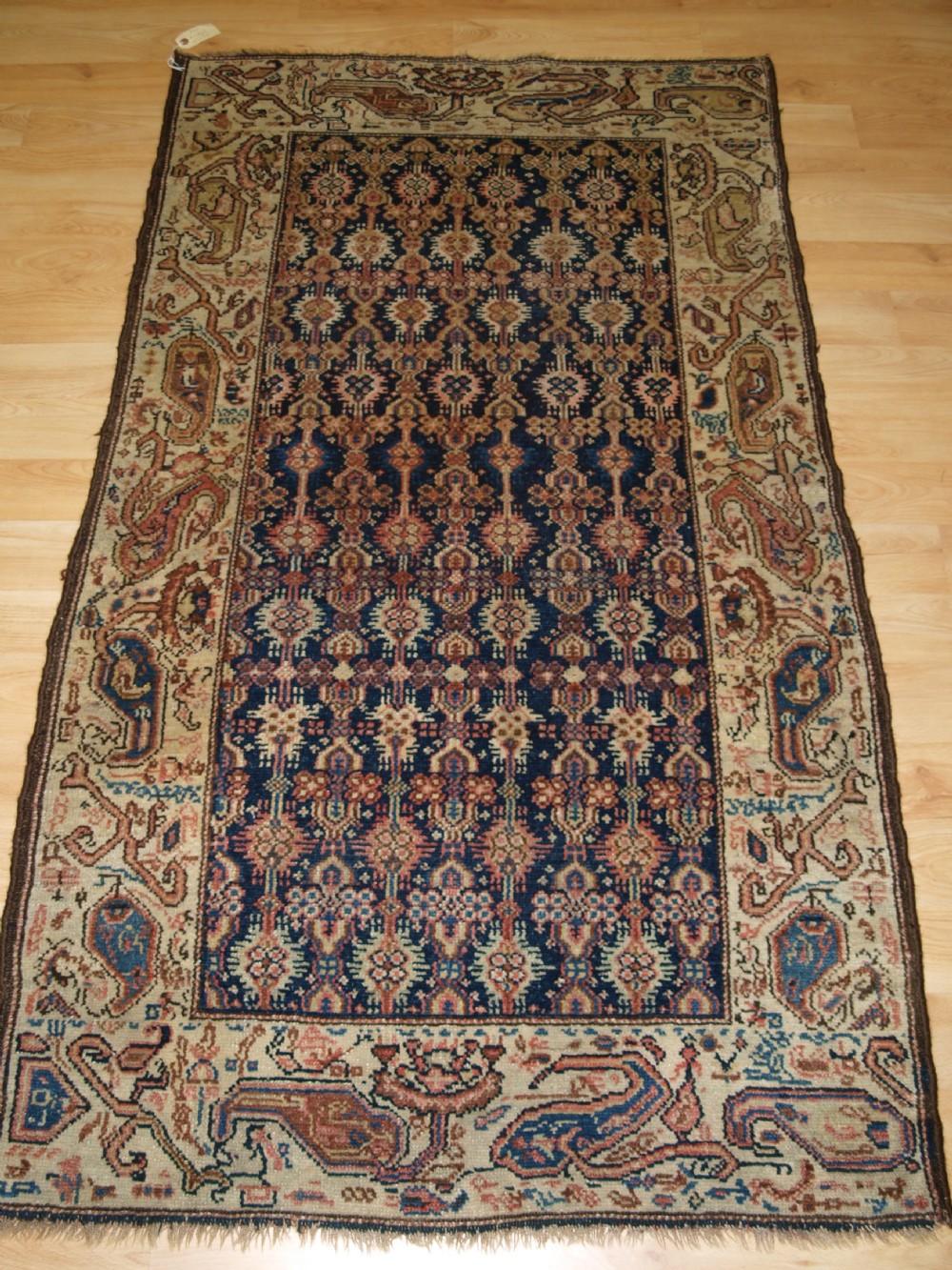 antique kurdish rug with large wild boteh design border soft colours circa 1900