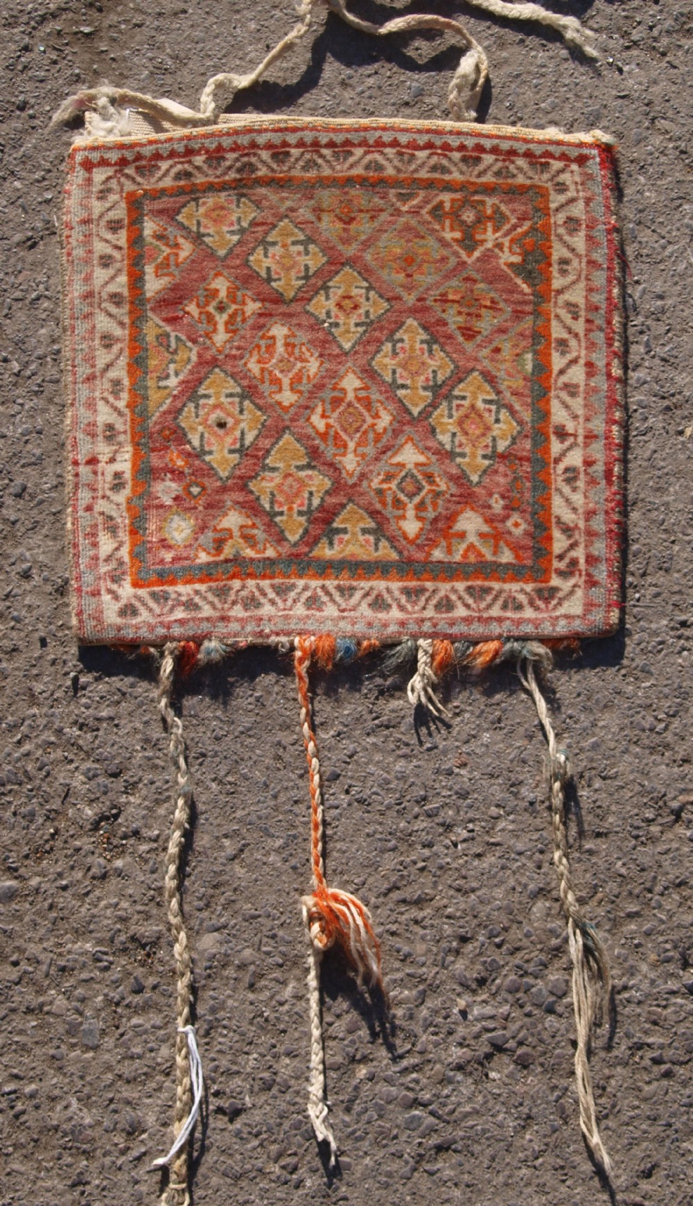 old south west persian qashqai chanteh with plain weave back and tassels circa 1920