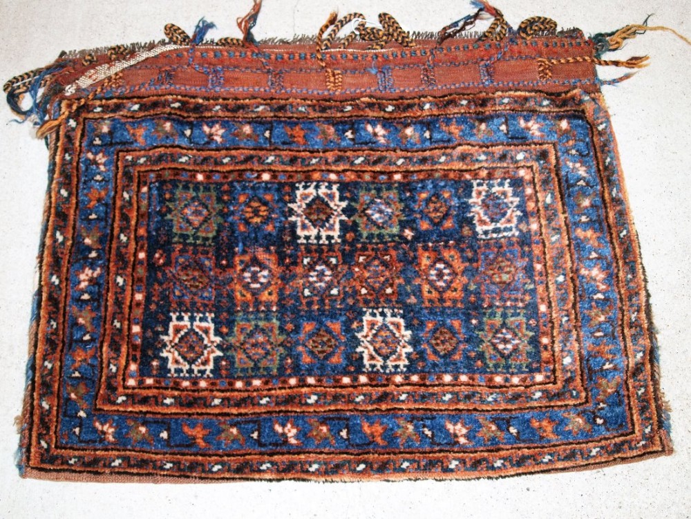 antique saddle bag with plain weave back possibly afshar circa 1900 one of a pair