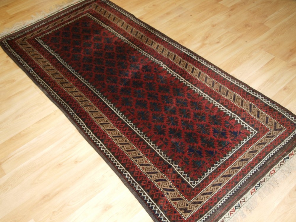 antique baluch rug with lattice design camel border kilim ends circa 1900
