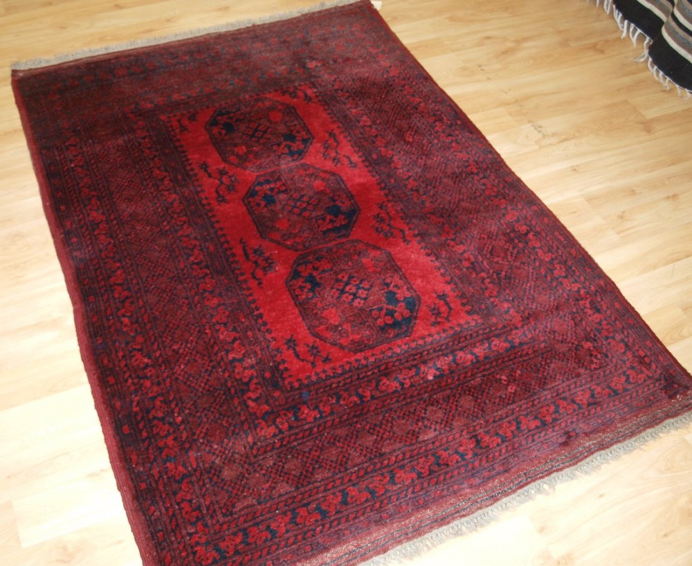 old afghan village rug with traditional design superb colour and condition circa 1920