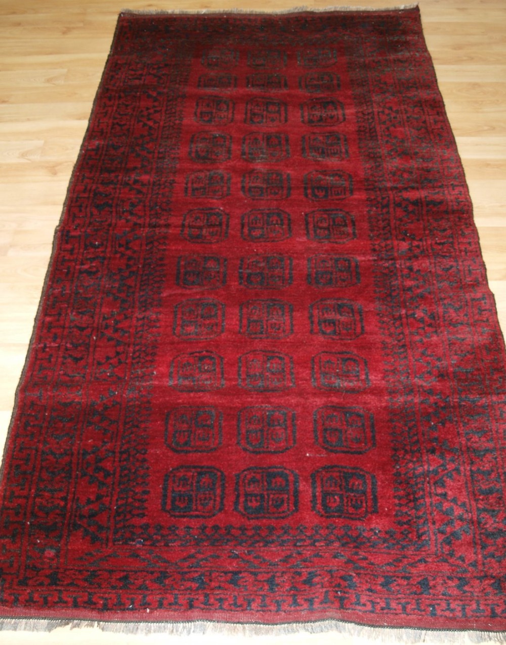 old afghan village rug traditional design deep red colour hard wearing circa 1920