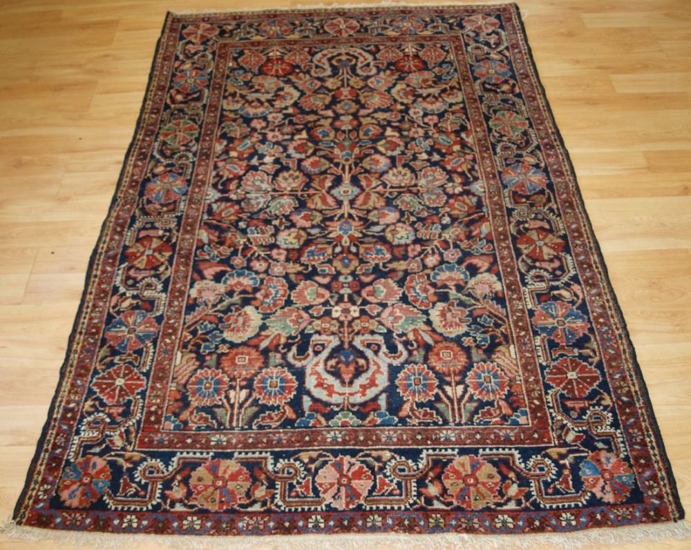 antique north west persian village rug greater hamadan floral design with cloud band circa 1900