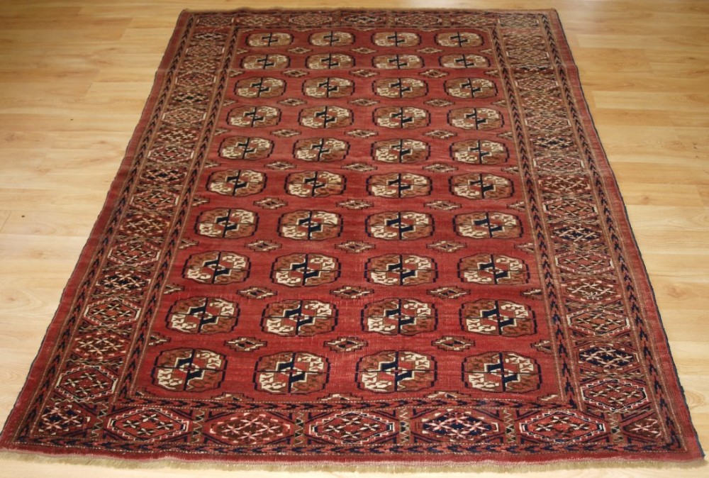 old tekke turkmen rug with soft faded red colour good furnishing rug circa 1920