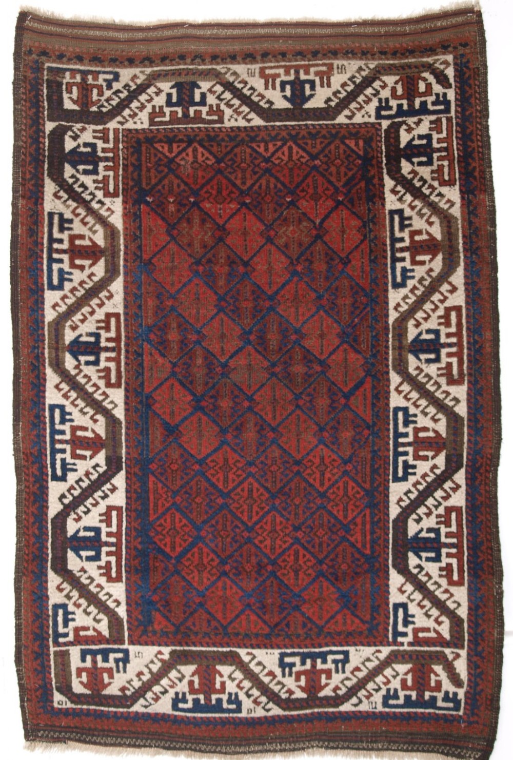 antique baluch rug of small size with ivory boat border and lattice design circa 1880