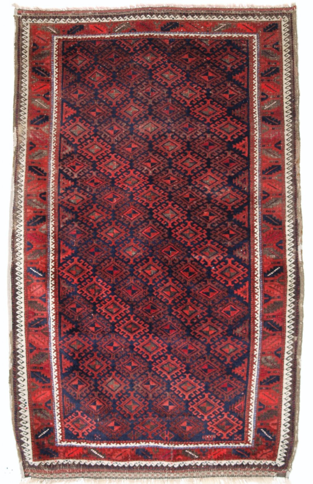 antique baluch rug of larger than normal size latch hook medallion lattice design circa 1880