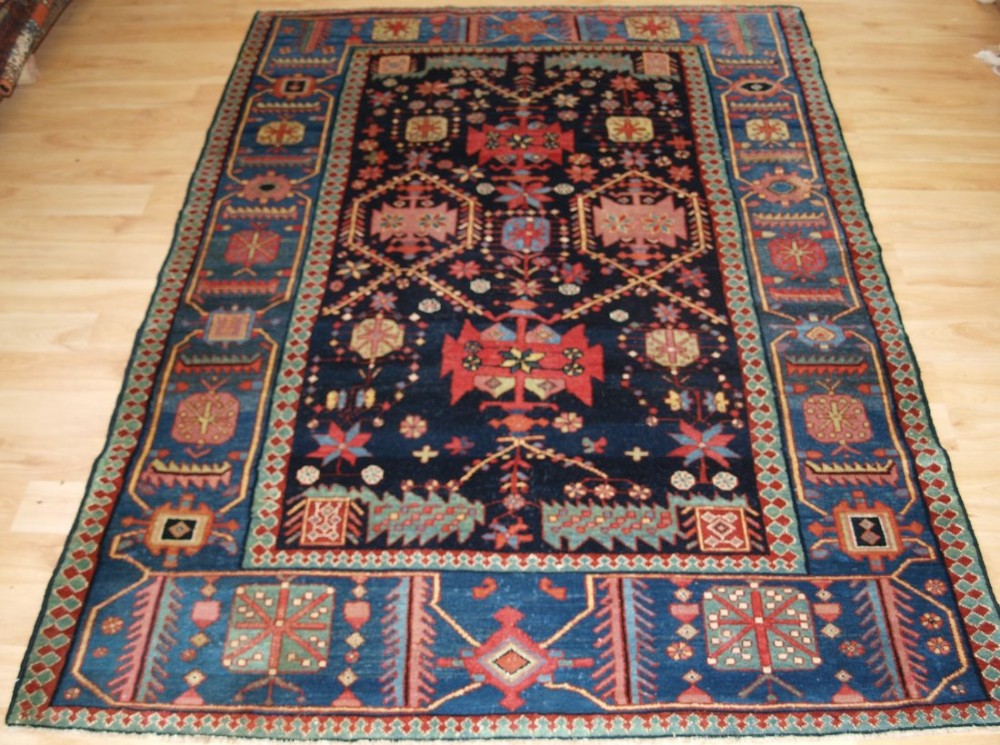 antique persian bakhtiari village rug with unusual design superb colours circa 190020