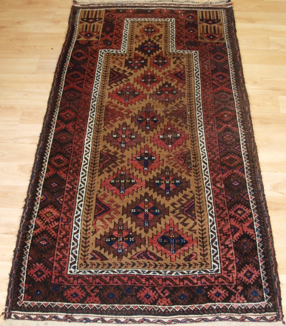 antique baluch prayer rug camel ground with interesting design circa 1900