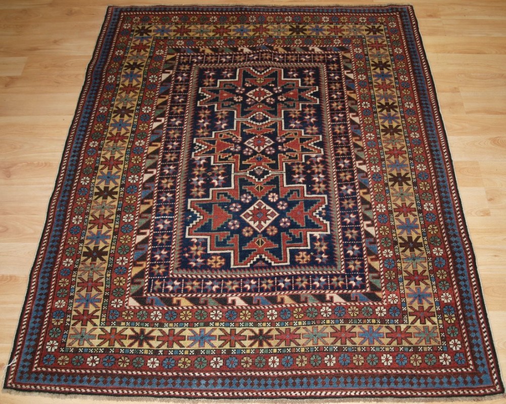 antique caucasian rug with 'leshgi star' design outstanding small rug late 19th century