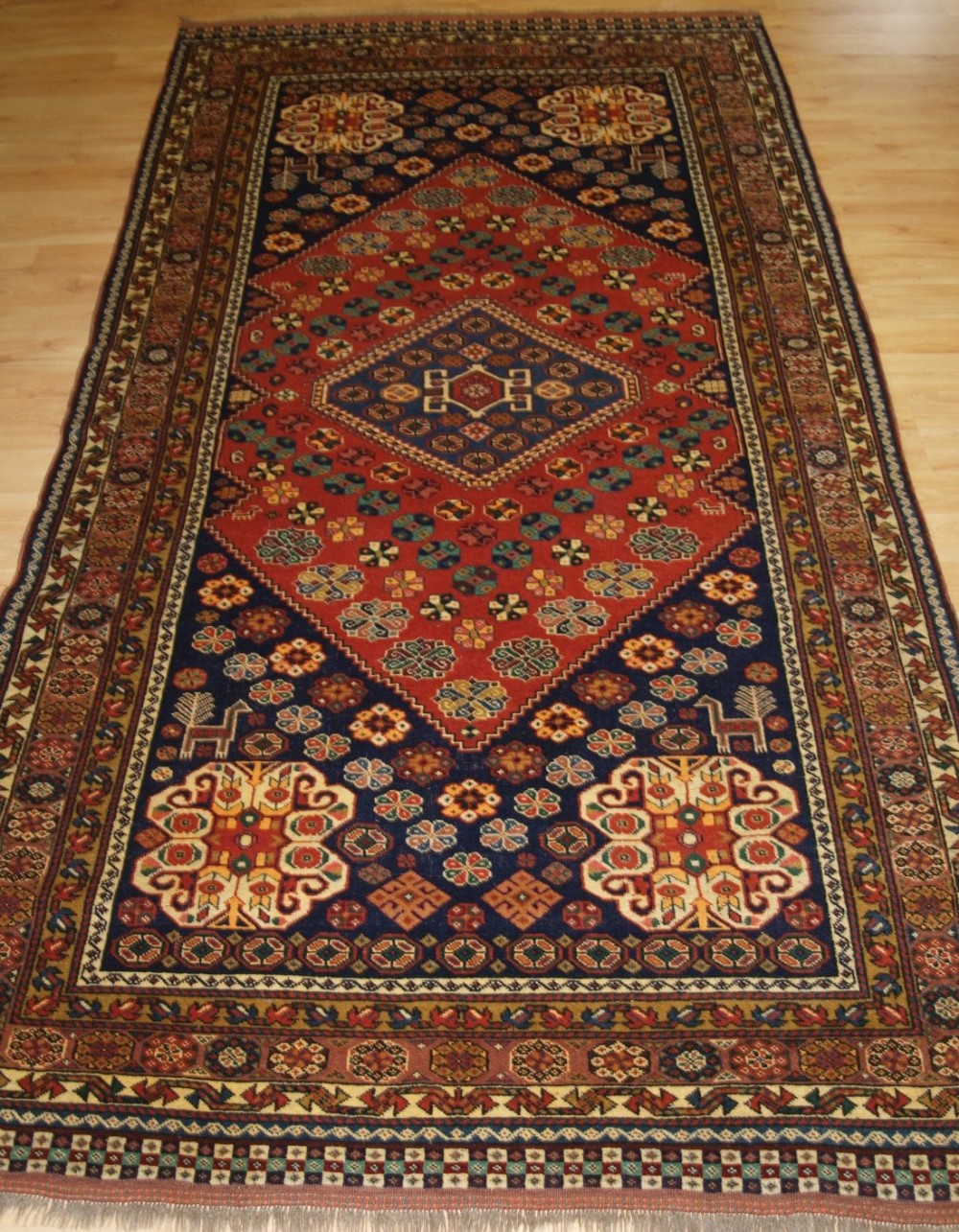 old afghan rug with persian qashqai design good colour and condition circa 20 years old