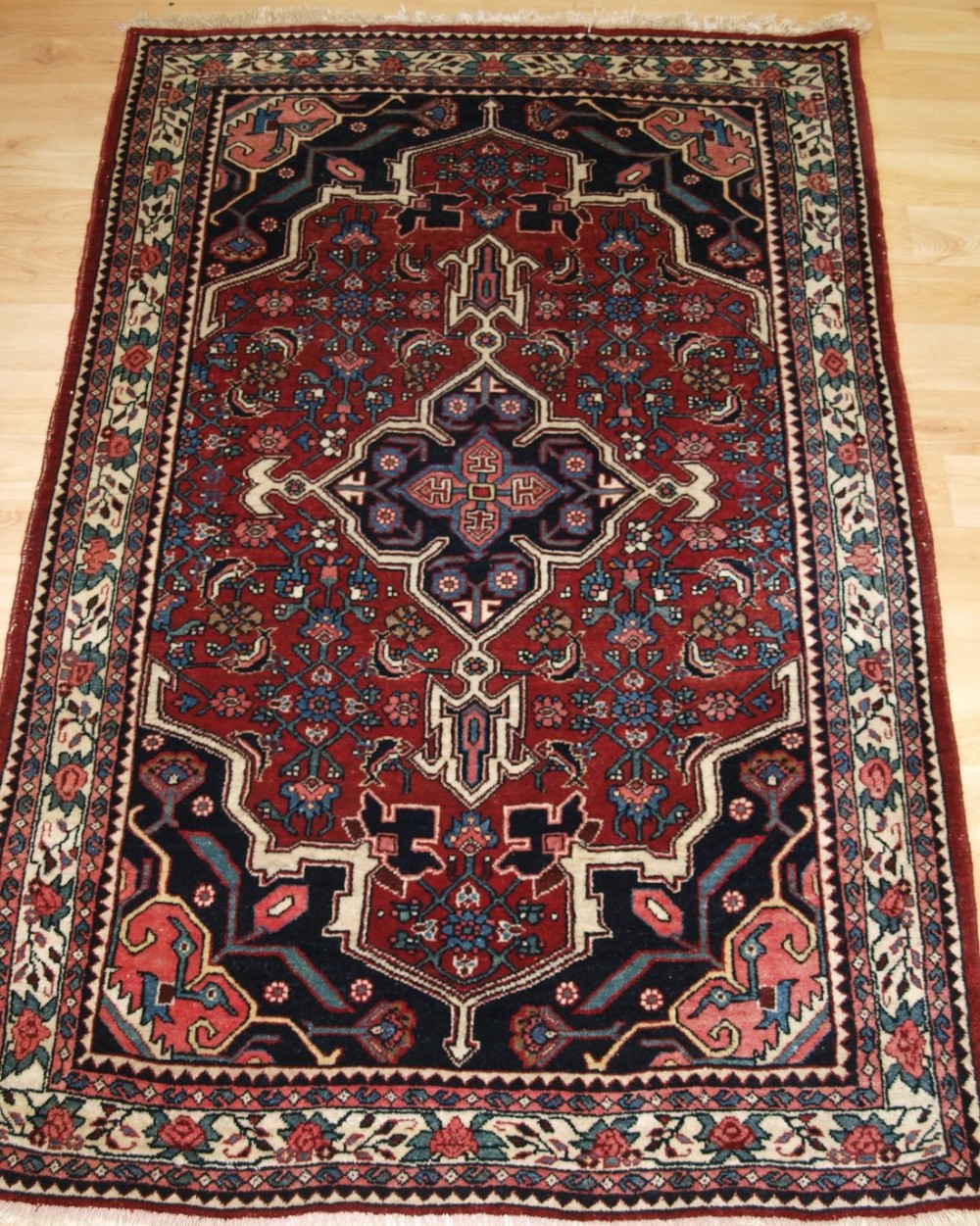 old persian bijar rug of fine weave traditional design small size circa 1920