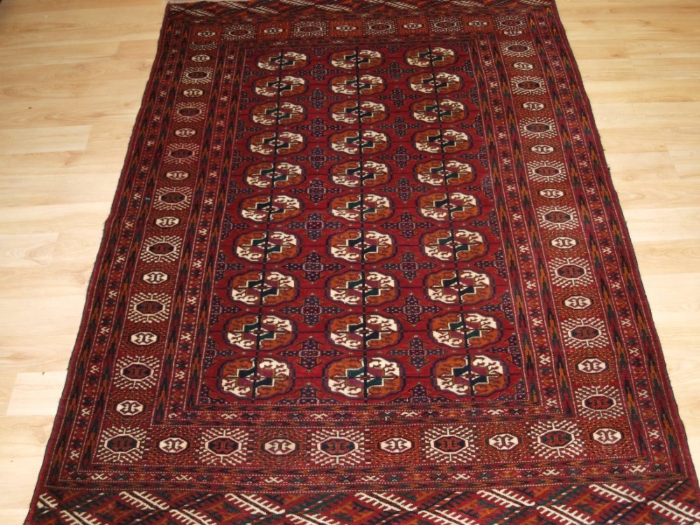 antique tekke turkmen 'dip khali' rug deep red colour great condition circa 190020