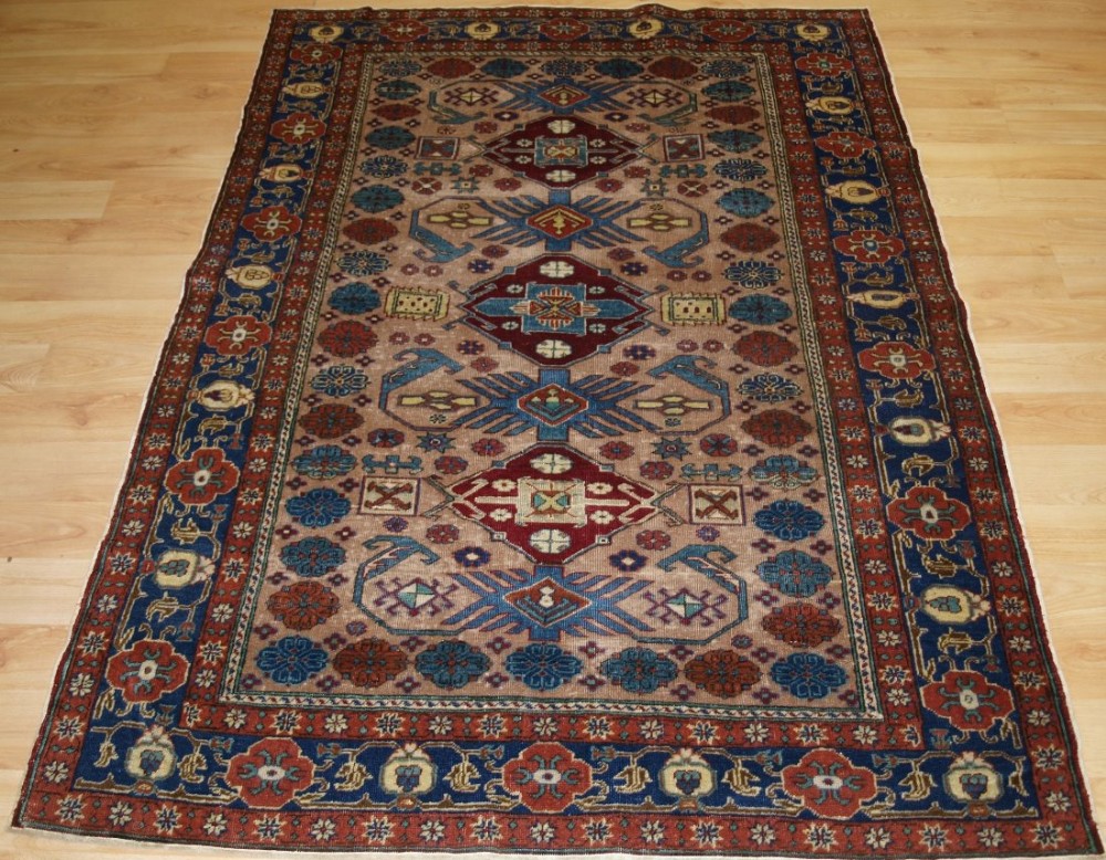 antique turkish kayseri rug with a caucasian kuba region design circa 190020