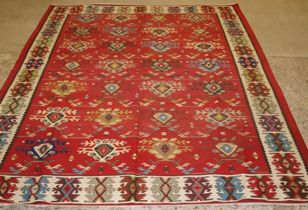 old turkish sarkoy kilim rug unusual design on soft red ground circa 1920
