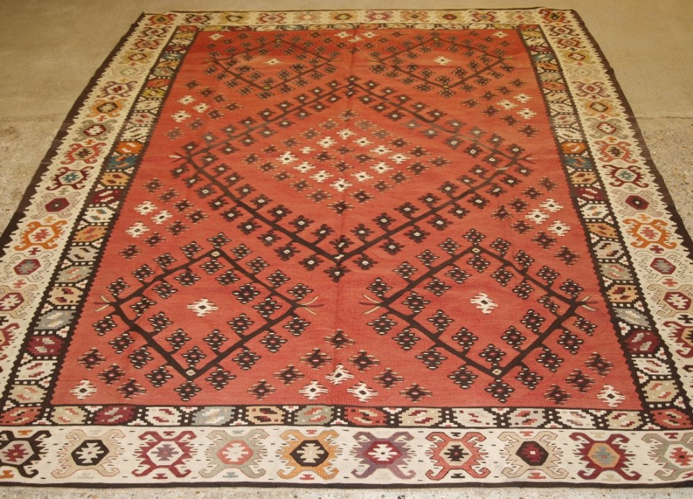 old turkish sarkoy kilim rug traditional design on soft red ground circa 1920