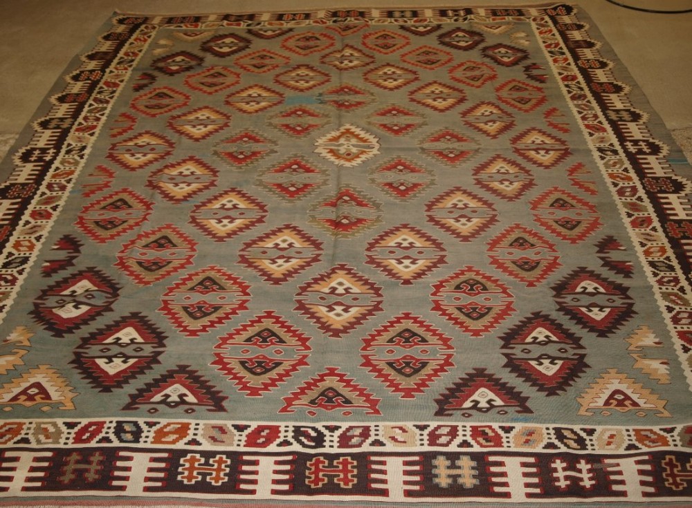 antique turkish sarkoy kilim rug rare design on soft powder blue ground circa 1900