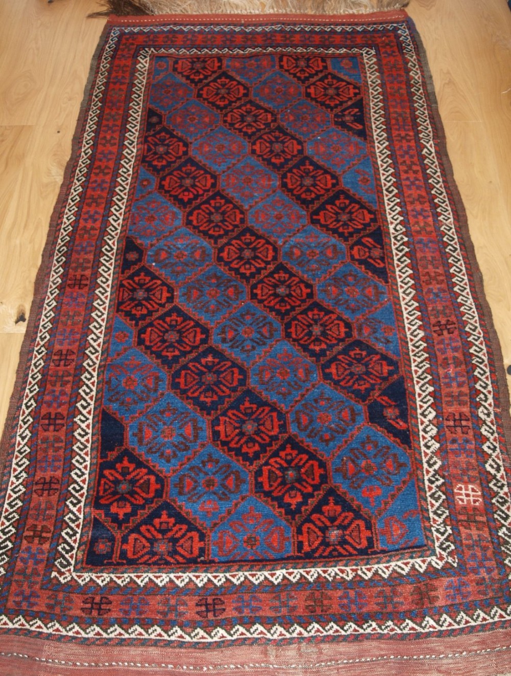 antique kordi rug with lattice design and superb colour circa 1900