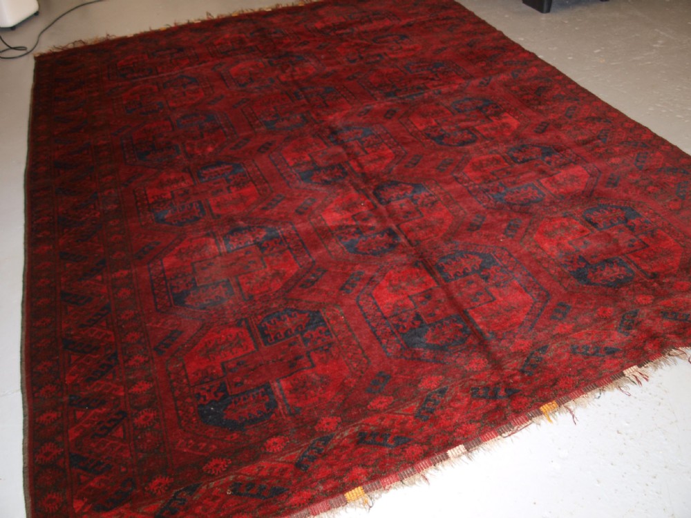 old afghan village carpet very deep red colour traditional design circa 1920