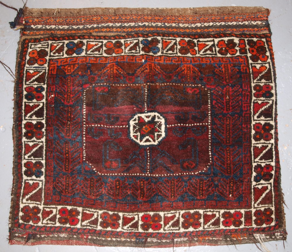 antique afghan baluch saddle bag with plain weave back circa 1900
