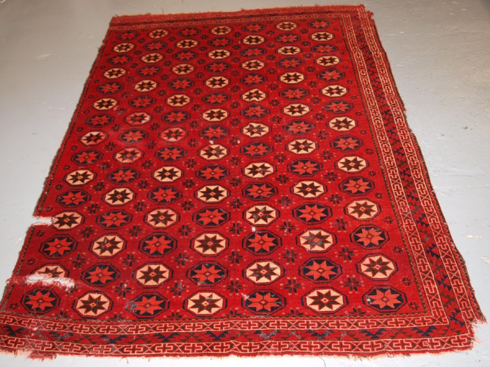 antique ersari turkmen main carpet fragment unusual star design 2nd half 19th century