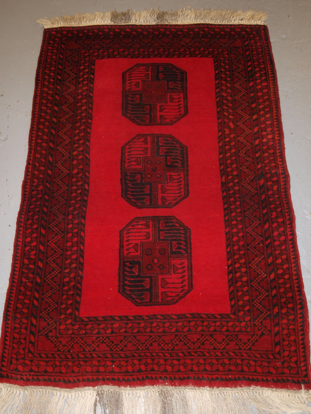 old afghan village rug bright red colour very tough hard wearing rug circa 1950