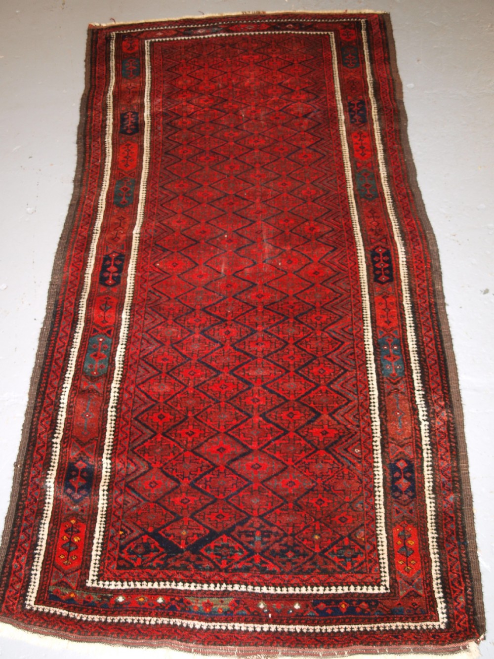 antique baluch rug with fine diamond lattice design interesting border circa 1900