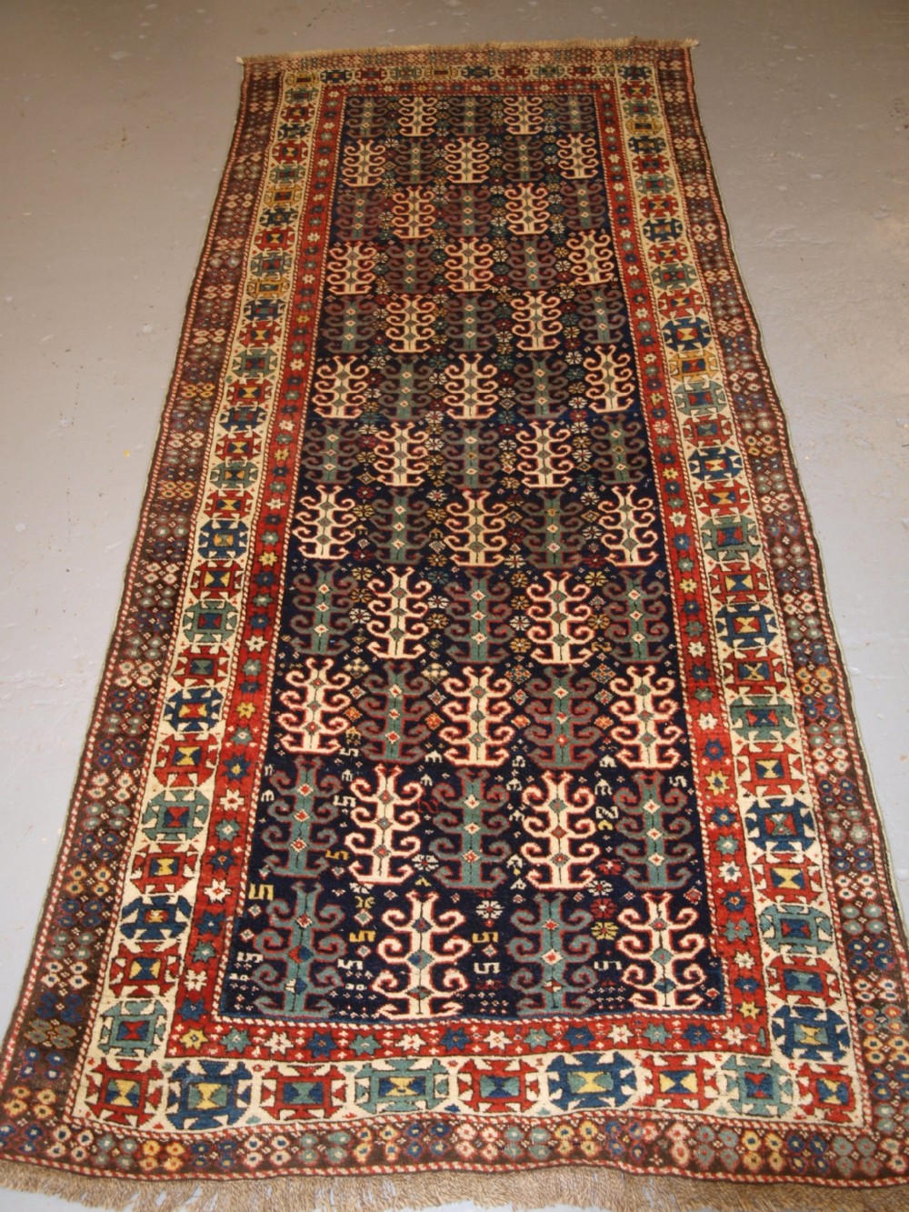 antique caucasian long rug with scarce design probably gendje region late 19th century