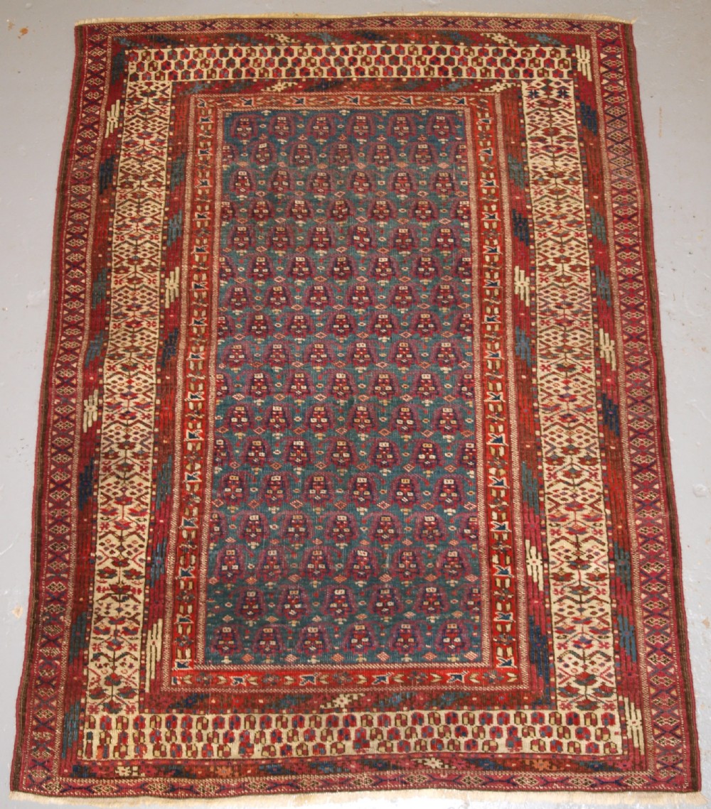 antique yomut or tekke turkmen blue ground dowry rug of rare format circa 1900