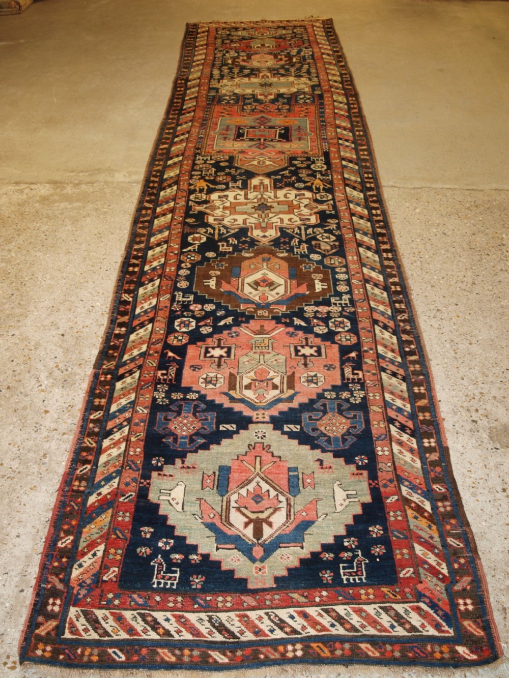 antique south east caucasian runner soft colours people and animals circa 1900