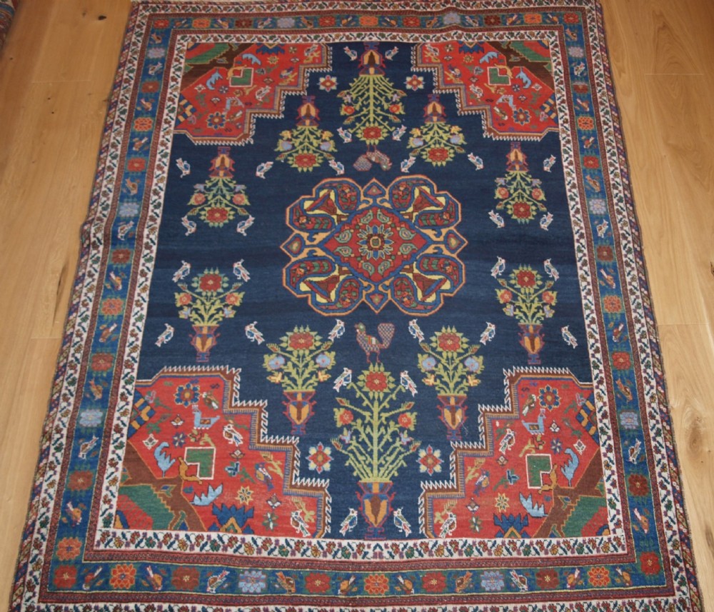 antique persian afshar rug with vase design birds and flowers circa 190020