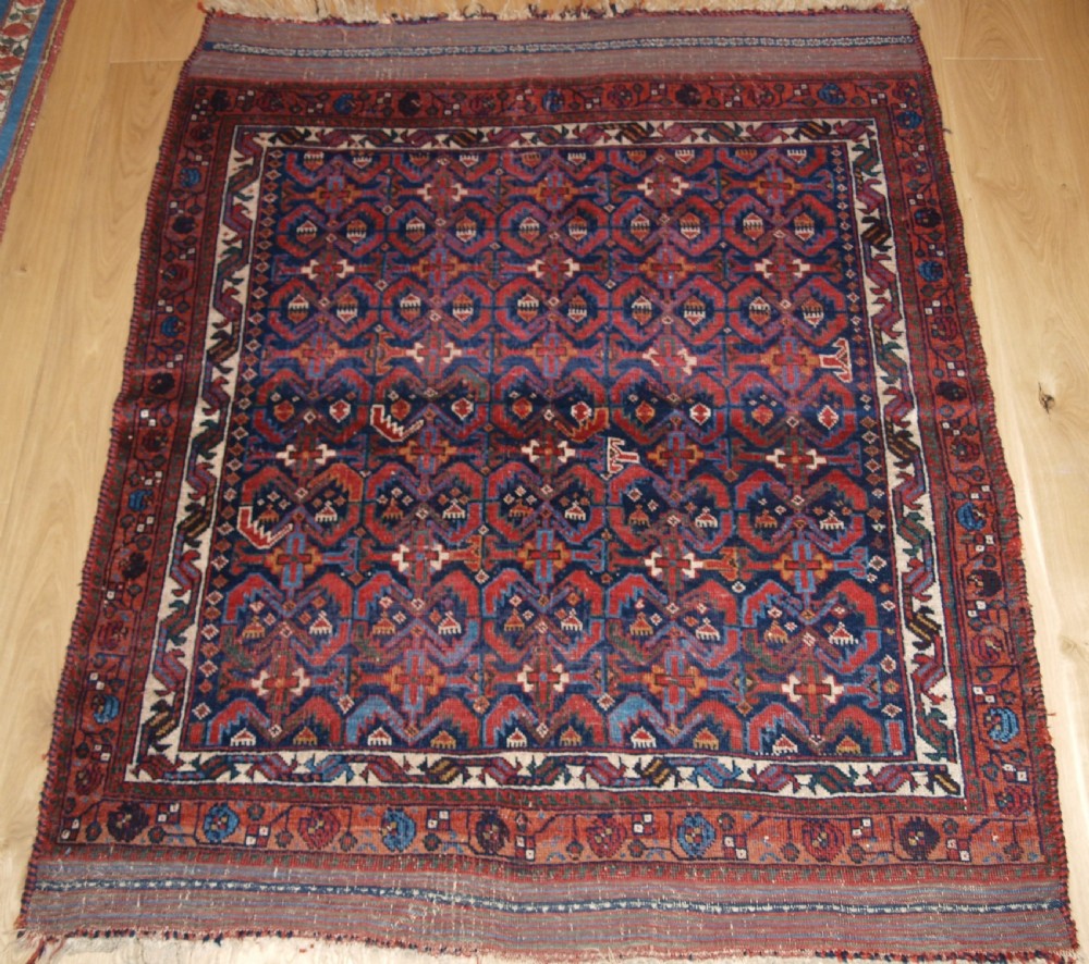 antique tribal afshar rug with repeat heratti design 2nd half 19th century