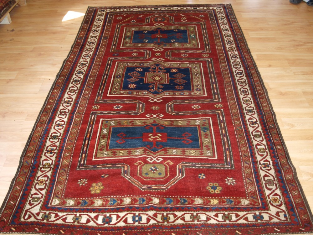 antique caucasian fachralo kazak long rug with niche design circa 1900