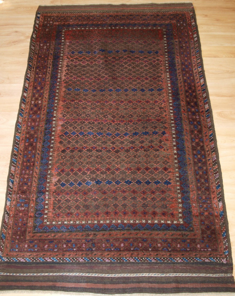 antique baluch rug with repeat design complete kilim ends circa 1900