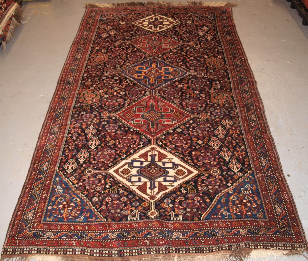 antique qashqai rug tribal design with great colour late 19th century