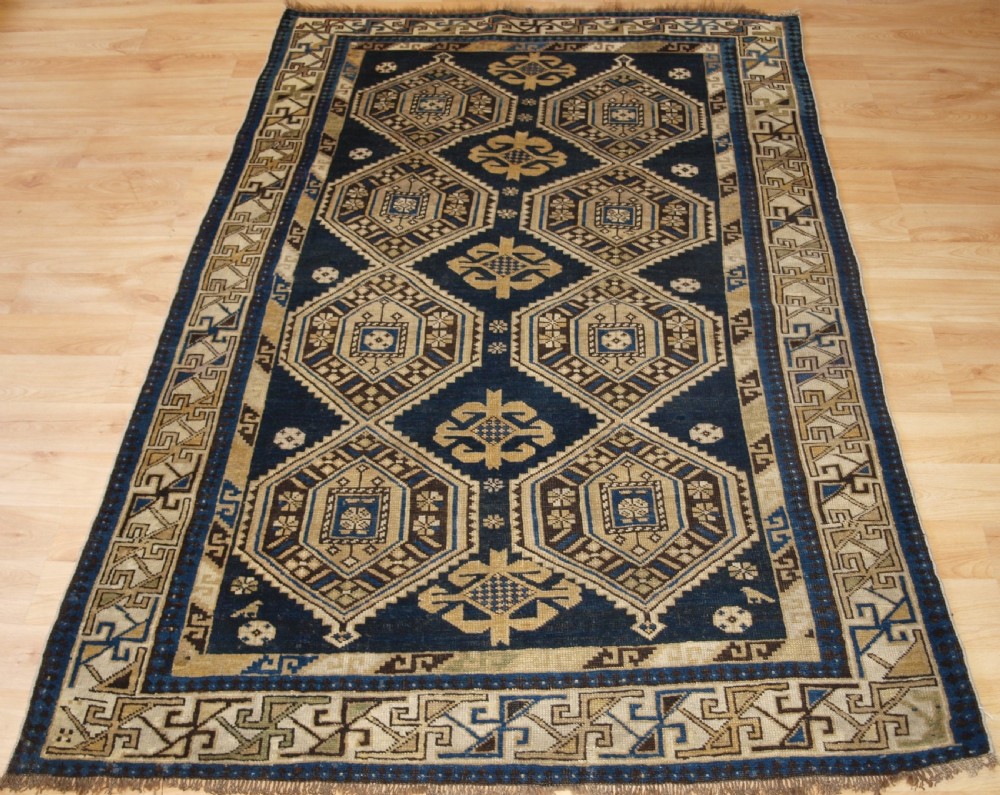 antique caucasian shirvan rug with soft faded colours circa 1900