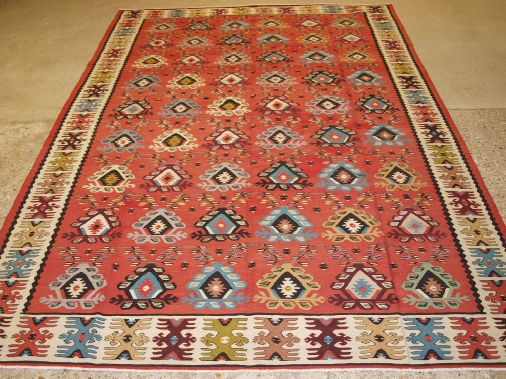 old sharkoy kilim with soft colour traditional repeat design circa 1920