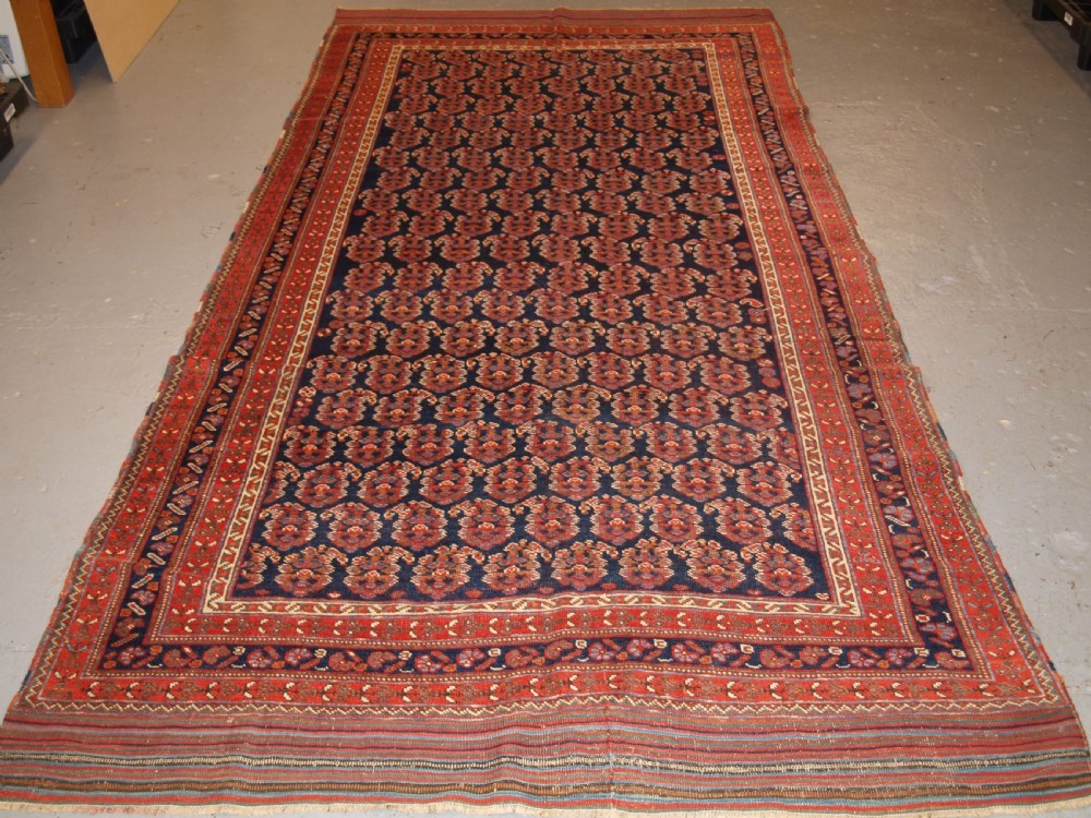 antique long rug by the afshar tribe boteh design circa 1890