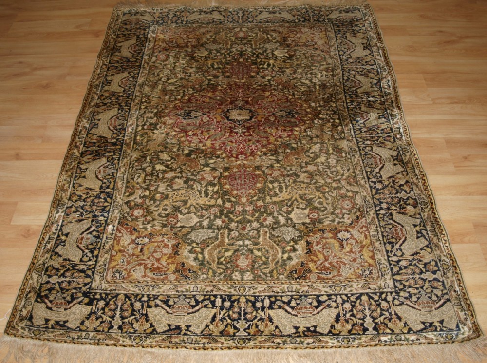 antique turkish kayseri pictorial silk rug with hunting design circa 1890